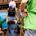 Child in diving outfit at workshop in the museum