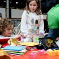 Children drawing at a table