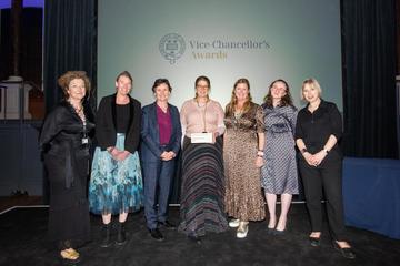 Winners of the Making a Difference Globally Award 2025 - The Maasai Living Cultures Project Winners of the Making a Difference Globally Award 2025 - The Maasai Living Cultures Project - stand on stage with the VC
