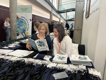 The welcome desk at Hope into Action conference