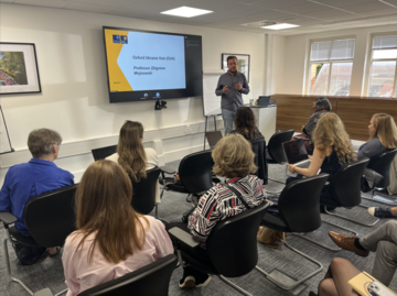 Professor Wojnowski presents to a room of attendess to introduce the Oxford Ukraine Hub