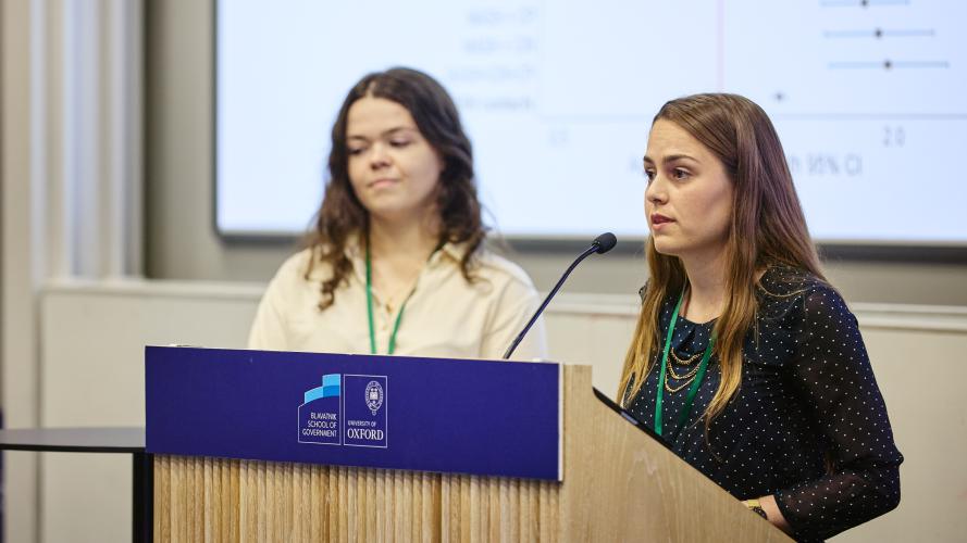 Savannah Verhage addresses an audience from the lectern