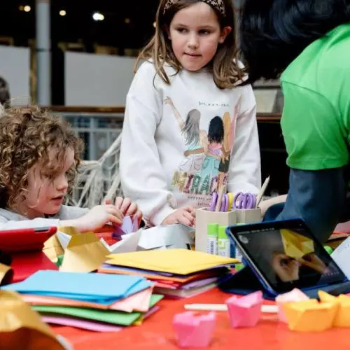 Children drawing at a table