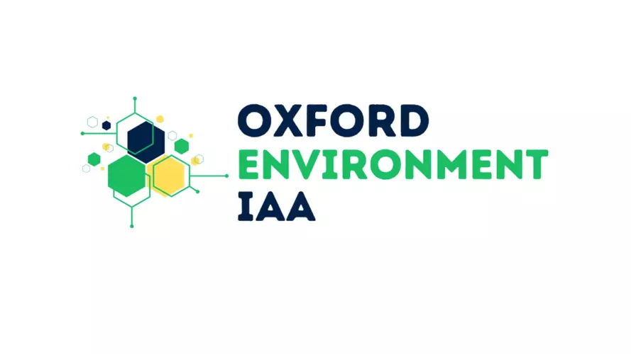 Oxford Environment IAA logo in blue and green with hexagonal graphics