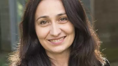 Image of Professor Alis Oancea smiling