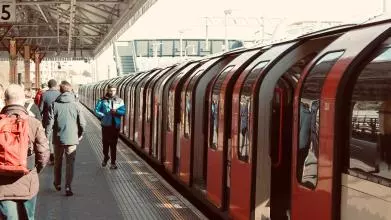 Workers commute on the London Underground