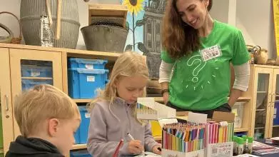 Children and volunteer at FoSS Aspiration Station event 