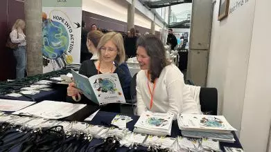 The welcome desk at Hope into Action conference