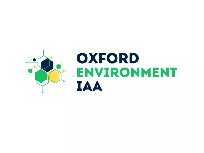 Oxford Environment IAA logo in blue and green with hexagonal graphics