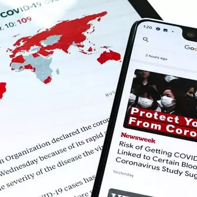 A Samsung Galaxy Tab S and Google Pixel 3XL show Coronavirus information