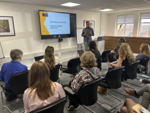 Professor Wojnowski presents to a room of attendess to introduce the Oxford Ukraine Hub